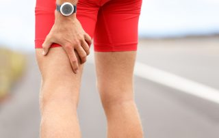 VW Physio working with a hamstring injury
